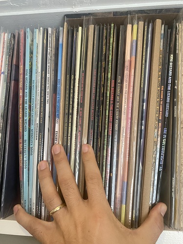 my hand can barely still palm all my Gizz vinyl